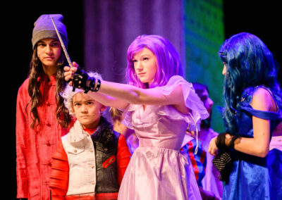 Emily Menell as Mal, Sophia Pavate as Jay, Maverick Scofield as Carlos and Avery Platt as Evie with the wand in Pied Piper Players' mainstage production of Disney's Descendants the Musical