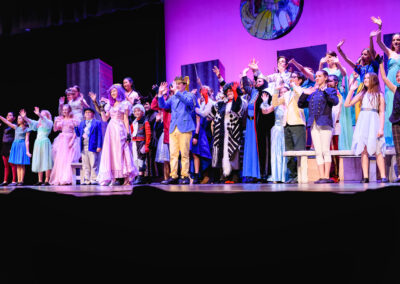 Pied Piper Players' mainstage production of Disney's Descendants the Musical curtain waving