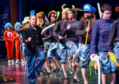 Mae Paulsen as General Ghengis Khan Schmitz and army singing Butter Side Up in PPPs Seussical